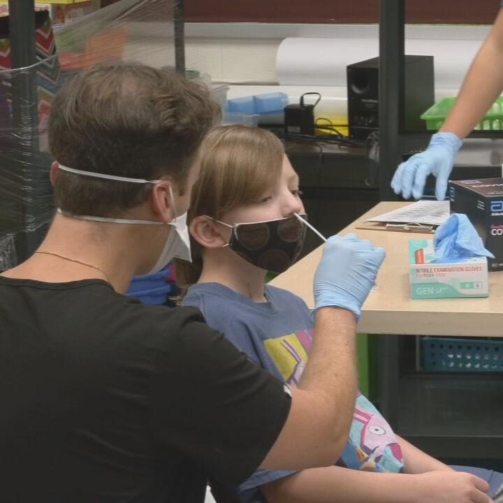JCPS student receiving a COVID-19